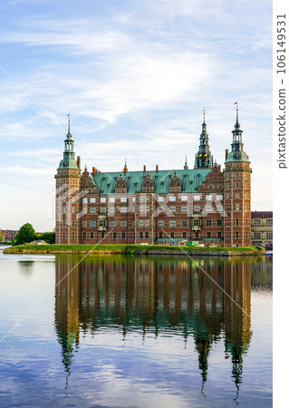 Frederiksborg castle in Hillerod, lakeside facade, beautiful facade reflection in lake water Frederiksborg castle in Hillerod, lakeside facade, beautiful facade reflection in lake water 106149531