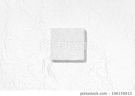 Flat lay cosmetic product presentation scene made with porous stone on craquelure background. Studio photography, top view. 106150013