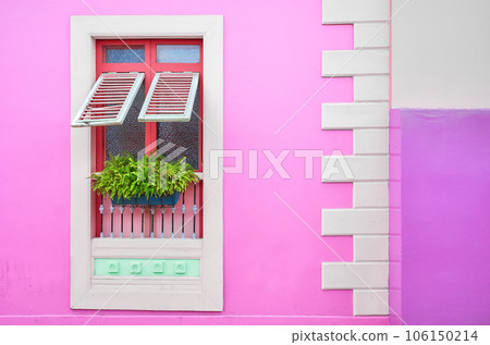 Street view of a colorful facade with window, architecture background, Guayaquil, Ecuador. Street view of a colorful facade with window, architecture background, Guayaquil, Ecuador. 106150214