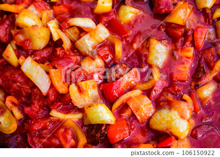 Letcho, a popular Hungarian food. Lecso. letcho with red pepper and tomato. Letcho, a popular Hungarian food. Lecso. letcho with red pepper and tomato. 106150922