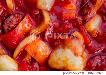 Letcho, a popular Hungarian food. Lecso. letcho with red pepper and tomato. Letcho, a popular Hungarian food. Lecso. letcho with red pepper and tomato. 106150925