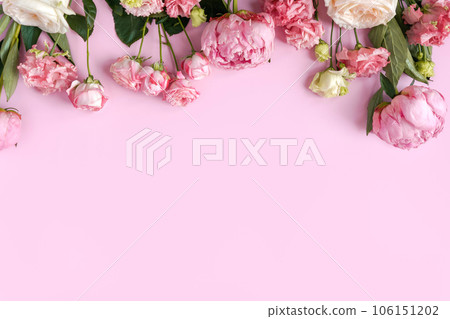 Peonies and roses on pink background with copy space. Abstract natural floral layout with space for text. Romantic feminine composition. Wedding invitation. International Women day, Mother Day concept 106151202