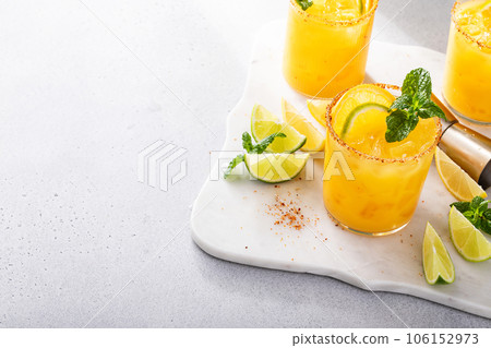Triple citrus margarita with orange, lemon and lime Triple citrus margarita with orange, lemon and lime 106152973