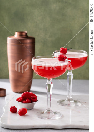 Raspberry martini cocktail with vodka, juice and raspberry liqueur 106152988