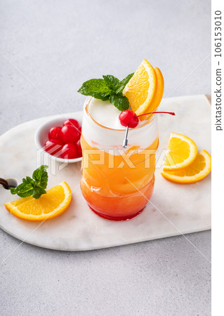 Zombie tropical cocktail with rum in tiki glasses 106153010