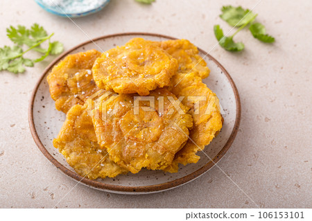 Tostones, traditional Carribean dish, twice fried plantains 106153101