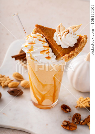 Pumpkin pie milkshake with caramel syrup and whipped cream 106153105
