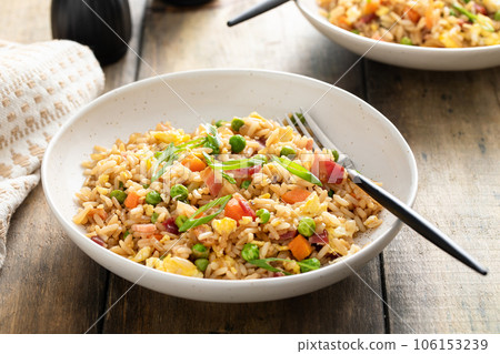 Breakfast fried rice with bacon and scrambled eggs Breakfast fried rice with bacon and scrambled eggs 106153239