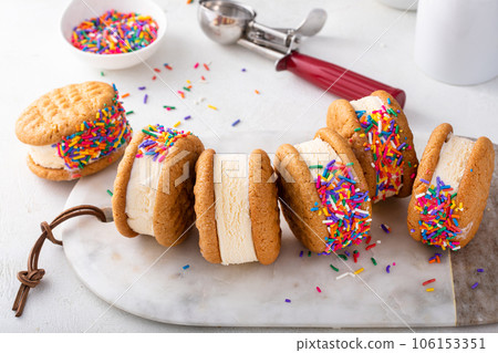 Ice cream sandwiches with vanilla ice cream and peanut butter cookies Ice cream sandwiches with vanilla ice cream and peanut butter cookies 106153351
