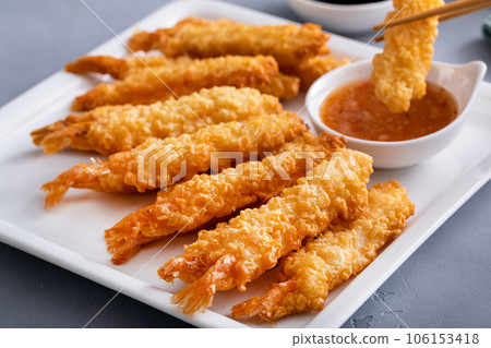 Tempura shrimp on a plate served with sweet and sour sauce Tempura shrimp on a plate served with sweet and sour sauce 106153418