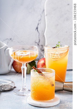 Variety of fall cocktails or mocktails made with apple cider Variety of fall cocktails or mocktails made with apple cider 106153468