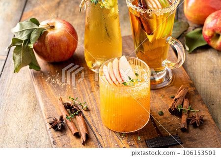 Variety of fall cocktails or mocktails made with apple cider Variety of fall cocktails or mocktails made with apple cider 106153501