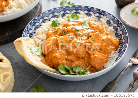 Chicken tikka masala, cooked marinated chicken in spiced curry sauce Chicken tikka masala, cooked marinated chicken in spiced curry sauce 106153575