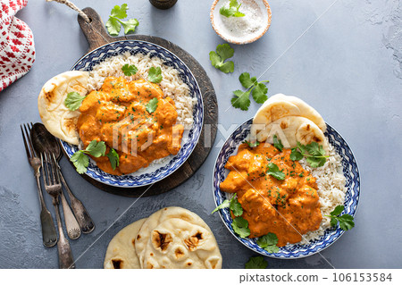 Chicken tikka masala, cooked marinated chicken in spiced curry sauce Chicken tikka masala, cooked marinated chicken in spiced curry sauce 106153584