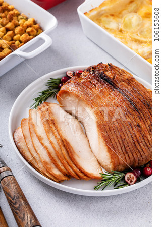 Christmas roasted turkey with all the side dishes, potato gratin and stuffing 106153608