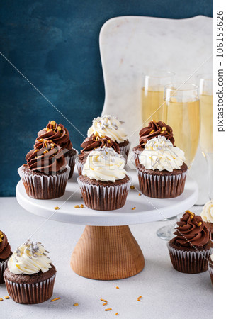 New Years eve cupcakes with festive sprinkles 106153626