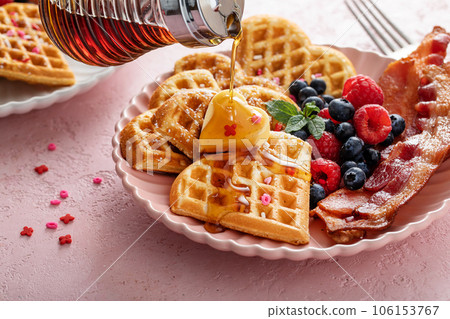 Valentines day breakfast for two with waffles heart shaped 106153767