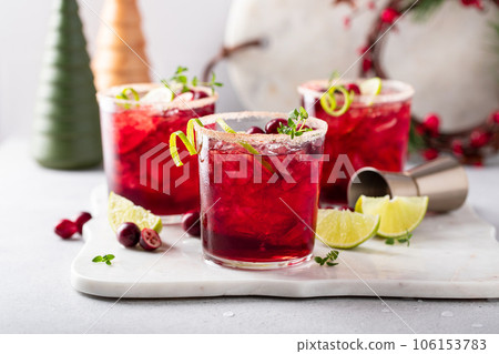Cranberry and lime margarita cocktail or mocktail Cranberry and lime margarita cocktail or mocktail 106153783