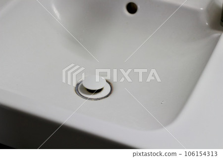 Washbasin sink, dirt in the drain, mold, hair Dirty washbasin Washbasin sink, dirt in the drain, mold, hair Dirty washbasin 106154313