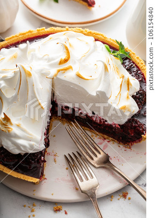 Blackberry pie topped with toasted meringue, dessert idea 106154840