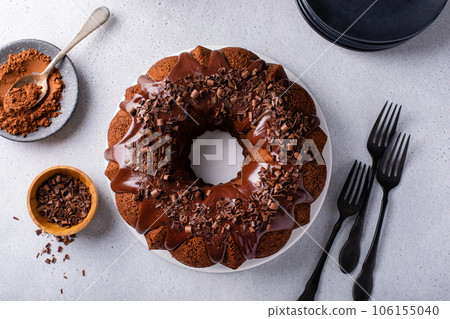 Chocolate bundt cake with chocolate ganache glaze Chocolate bundt cake with chocolate ganache glaze 106155040