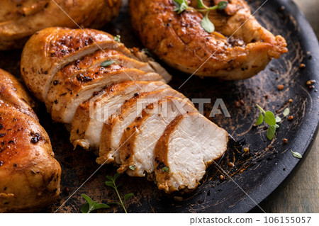 Roasted or seared chicken breast with herbs Roasted or seared chicken breast with herbs 106155057