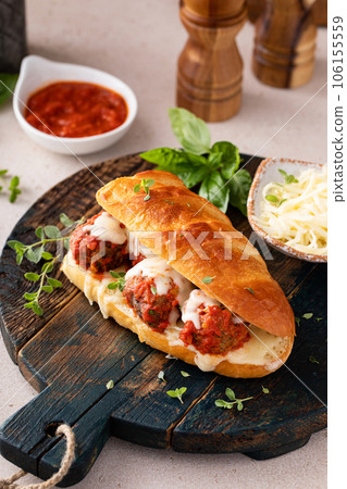 Meatball sub sandwich with marinara and mozzarella Meatball sub sandwich with marinara and mozzarella 106155559