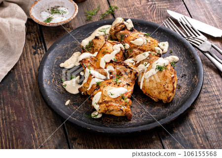 Roasted chicken thighs with dill pickle sauce Roasted chicken thighs with dill pickle sauce 106155568