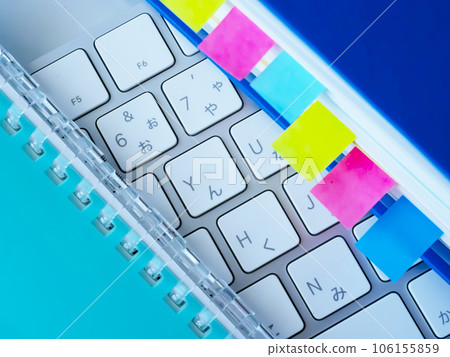 Documents, notebooks and keyboards on the table 106155859