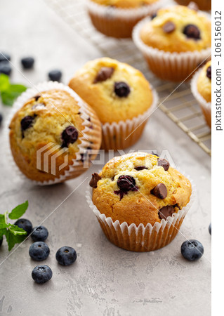 Chocolate chip and blueberry muffins freshly baked Chocolate chip and blueberry muffins freshly baked 106156012