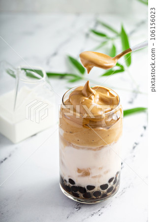 Boba dalgona coffee with tapioca pearls and whipped coffee Boba dalgona coffee with tapioca pearls and whipped coffee 106156023