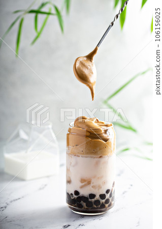 Boba dalgona coffee with tapioca pearls and whipped coffee Boba dalgona coffee with tapioca pearls and whipped coffee 106156025