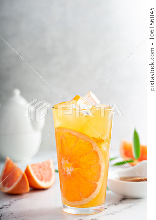 Grapefruit honey jasmine tea served cold with ice 106156045