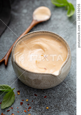 Homemade creamy chili dip sauce or dressing 106156056