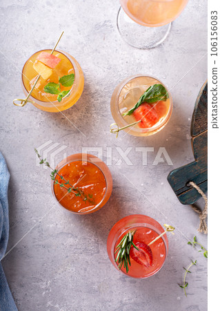 Summer cocktails or mocktails with herbs and fruit 106156083