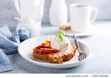 French toast with peaches and vanilla ice cream French toast with peaches and vanilla ice cream 106156088