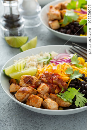 Mexican burrito bowl with salsa chicken and beans 106156093