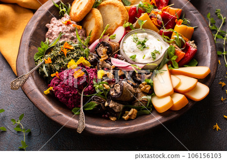 Vegetarian appetizers Georgian cuisine, bread, dips and cheese 106156103