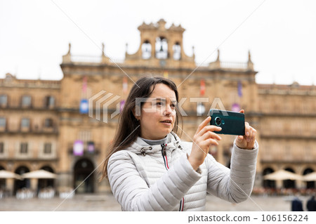Woman tourist with phone, Salamanca, Spain Woman tourist with phone, Salamanca, Spain 106156224