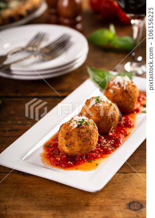 Mozzarella arancini, stuffed rice balls, italian appetizer 106156225