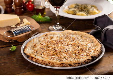 White cheese neapolitan style pizza with artichokes White cheese neapolitan style pizza with artichokes 106156228