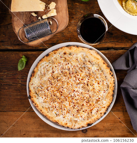 White cheese neapolitan style pizza with artichokes White cheese neapolitan style pizza with artichokes 106156230