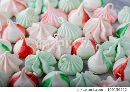 Peppermint meringues on a marble table, Christmas treat 106156332