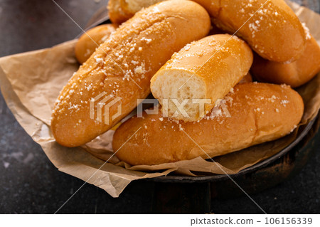 Garlic rolls freshly baked on a plate Garlic rolls freshly baked on a plate 106156339