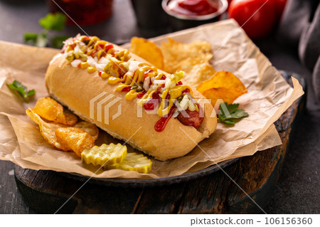 Traditional american hot dog with mustard and ketchup 106156360