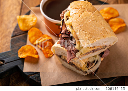 Italian beef sandwich au jus in a bowl 106156435