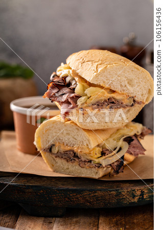 Italian beef sandwich au jus in a bowl Italian beef sandwich au jus in a bowl 106156436