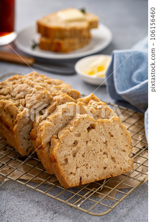 Beer bread on a cooling rack sliced and ready to eat 106156460