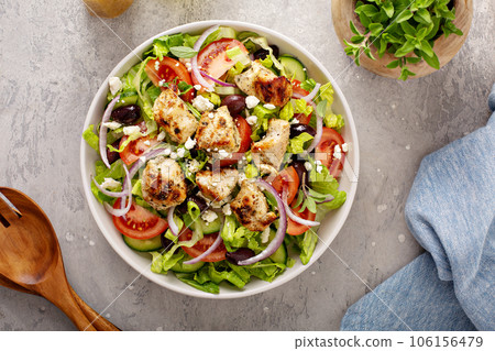 Fresh vegetables and feta greek salad with homemade dressing 106156479