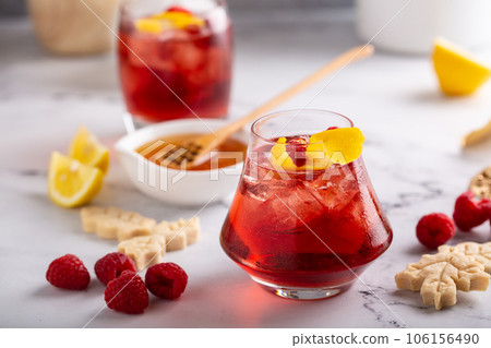 Raspberry grapefruit refreshing cocktail with mint leaves 106156490